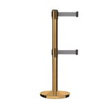 Retractable Dual Belt Barrier Stanchion, Cast Iron Base, Satin Brass Post, 11 ft Belt - Montour Line MI630D - Crowd Control Warehouse