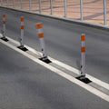 FlexStake Center Line Surface Mount Base Traffic Delineator - Gray Tubular Post with Reflective Options
