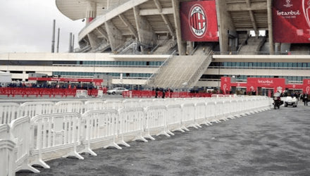 Movit 6.5 Ft. Interlocking Plastic Barricade at a Stadium