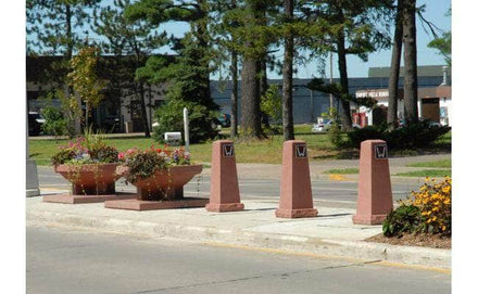 Obelisk security Bollard with Base for sale along a sidewalk