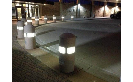 Concrete security bollard with built in lighting for sale along path