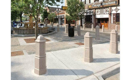 Ornate, Imperial Style Decorative Bollard for sale placed in an outdoor shopping market
